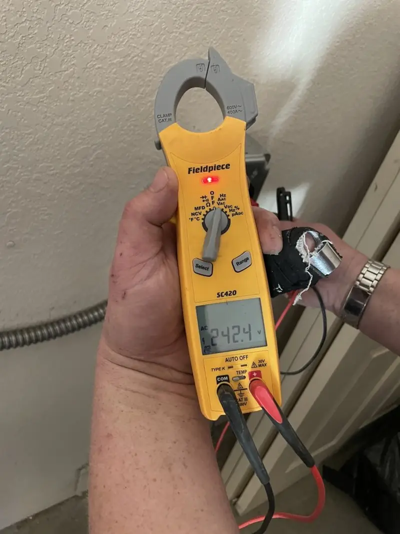Voltage testing with clamp meter during Circuit Breaker Repair in Mount Vernon